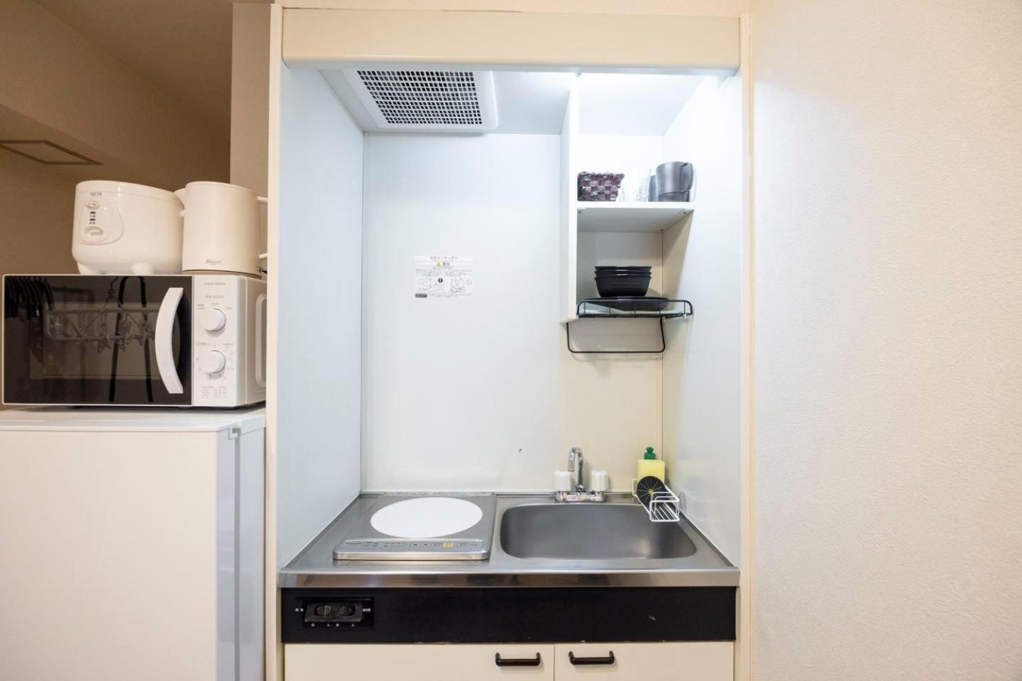 Shinjuku Okada Building Apartment Tokyo Exterior photo